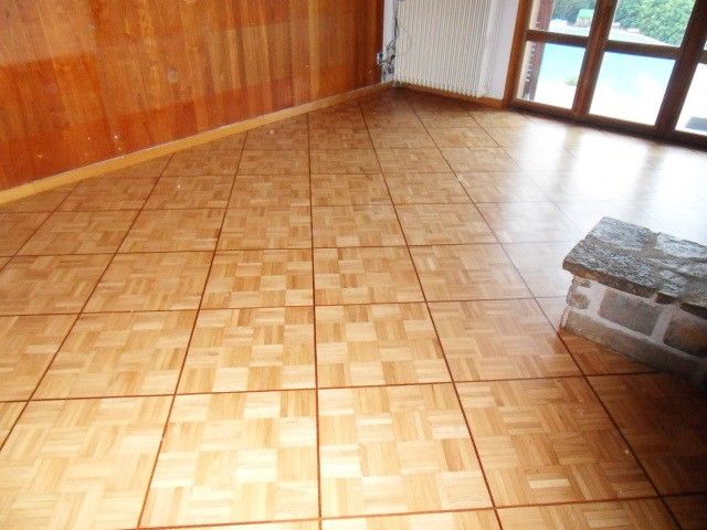 PARQUET MOSAIQUE AVEC LISTEL EN IROKO