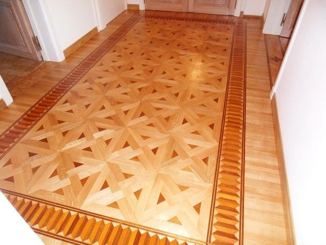 PARQUET CHENE AVEC FRISE ET DECOR EN IROKO ET MERBAU