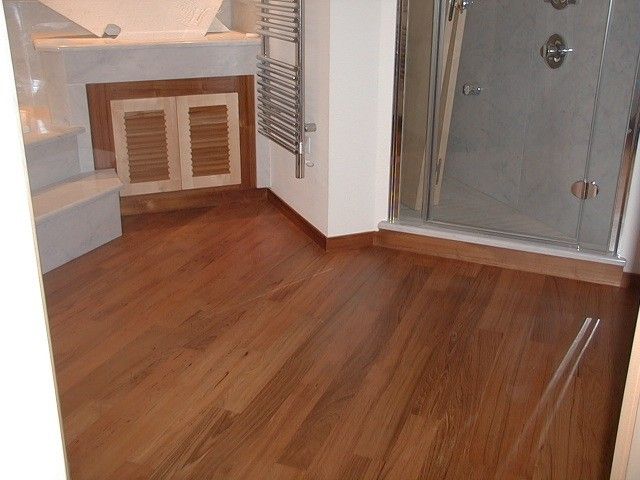 PARQUET EN TECK POSE A JOINTS PERDUS